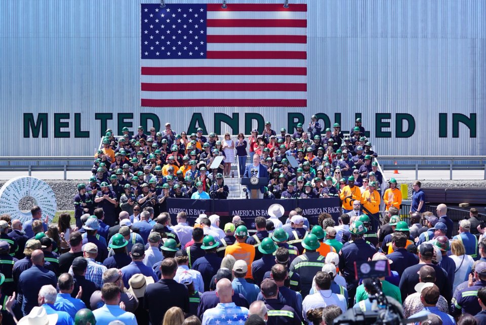 Wide shot of a large crowd gathered in front of the Nucor Steel Plant to listen to VP Vance and Administrator Zeldin, May 1, 2025