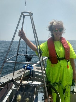 Michaela Cashman collecting sediment samples from Narragansett Bay (Rhode Island)